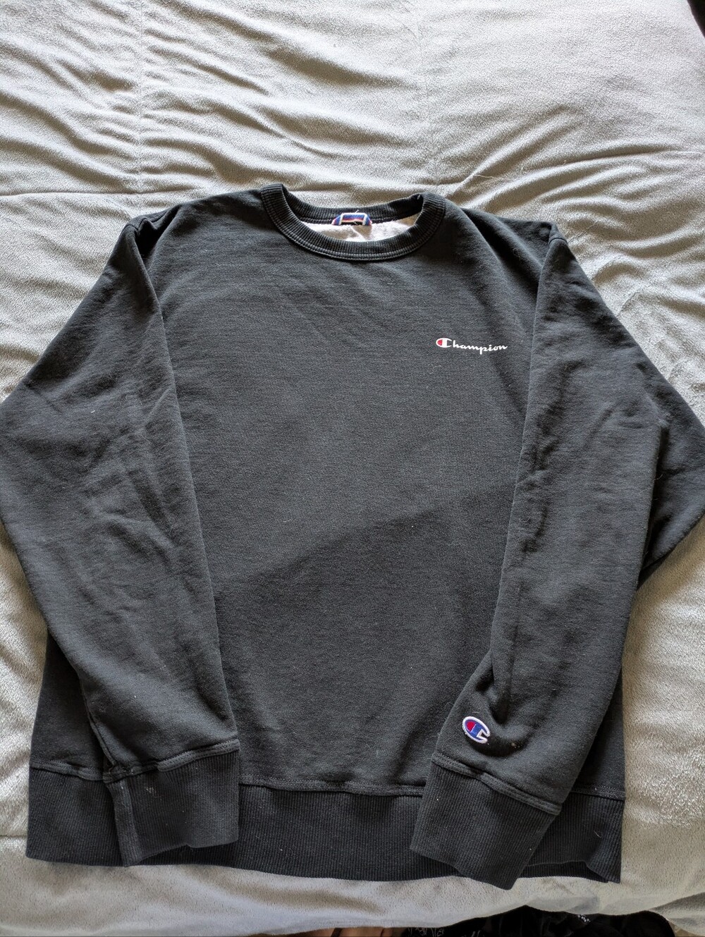 Champion Men's Black Crewneck Sweatshirt with Small Logo.